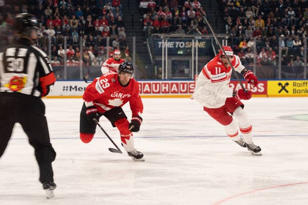 FRIBOURG, FRIBOURG - MAY 18: Parker Wotherspoon of Canada battles with Alexander True of Denmark during the 2026 IIHF World Championship, WM, Weltmeisterschaft Preliminary Round Group B match between Canada and Denmark at BCF Arena on May 18, 2026 in Fribourg, Fribourg, Switzerland. Copyright: xLivioxBaeriswylx xSPPx Sportspressphoto_SPR149931