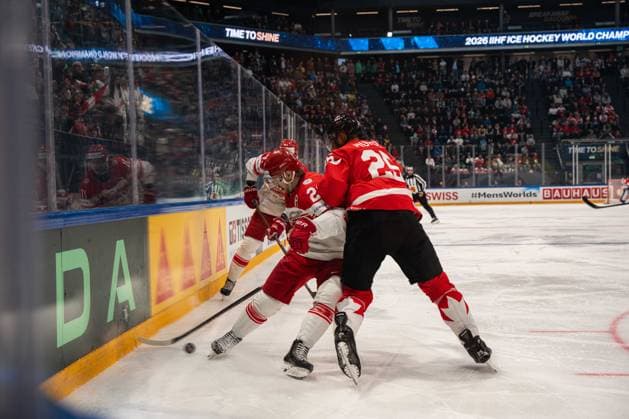 FRIBOURG, FRIBOURG - MAY 18: Mikkel Aagaard of Denmark battles with Darnell Nurse of Canada during the 2026 IIHF World Championship, WM, Weltmeisterschaft Preliminary Round Group B match between Canada and Denmark at BCF Arena on May 18, 2026 in Fribourg, Fribourg, Switzerland. Copyright: xLivioxBaeriswylx xSPPx Sportspressphoto_SPR149933