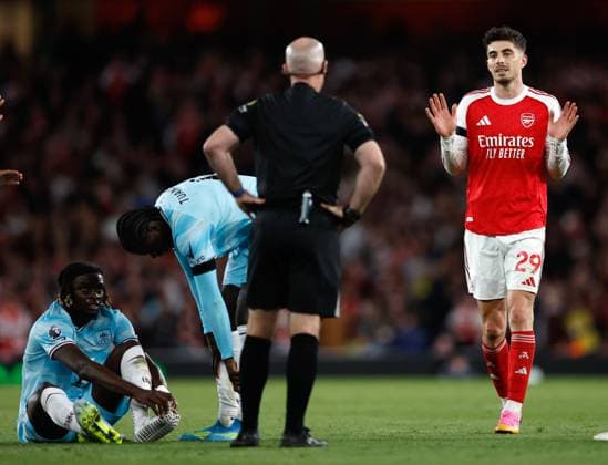Kai Havertz of Arsenal fouls Lesley Ugochukwu of Burnley but protests his innocence to referee Paul Tierney Arsenal v Burnley, Football, Premier League, Emirates Stadium, Islington, London, UK - 18 05 2026 EDITORIAL USE ONLY No use with unauthorised audio, video, data, fixture lists, club league logos or live services. Online in-match use limited to 120 images, no video emulation. No use in betting, games or single club league player publications. Copyright: xMattxImpey Shutterstockx 16882378z