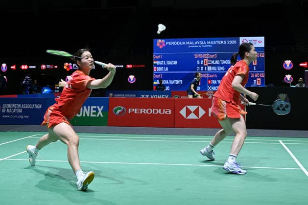 (260519) -- KUALA LUMPUR, May 19, 2026 -- Chen Fanshutian (L) Luo Xumin compete during the women s doubles round of 32 match between Chen Fanshutian Luo Xumin of China and Polina Buhrova Yevheniia Kantemyr of Ukraine at 2026 Malaysia Masters badminton tournament in Kuala Lumpur, Malaysia, May 19, 2026. (Photo by Xinhua) (SP)MALAYSIA-KUALA LUMPUR-BADMINTON-MALAYSIA MASTERS-WOMEN S DOUBLES ChongxVoonxChung 