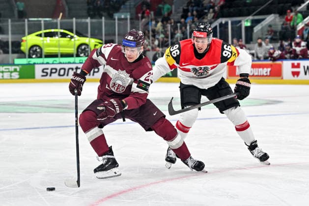 ZURICH, SWITZERLAND MAY 19 Sandis Vilmanis of Latvia in action against Mario Huber of Austria during the 2026 IIHF Ice Hockey World Championship Switzerland game between Latvia and Austria at Swiss Life Arena on May 19, 2026 in Zurich, Zurich Zurich Swiss Life Arena Zurich Switzerland Copyright: xJustPictures.ch AndreaxBrancax jp-en-EuSpIm-JP7_ANB_Lat_Aut_19052026_3199