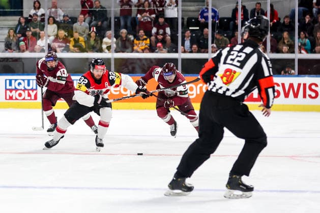 Ice hockey, Eishockey - IIHF WC 2026 ZURICH,SWITZERLAND,19.MAY.26 - ICE HOCKEY - IIHF Ice Hockey World Championship, WM, Weltmeisterschaft 2026, group stage, Austria vs Latvia. Image shows Olivers Murnieks (LAT), Bernd Wolf (AUT) and Renars Krastenbergs (LAT).  GEPAxpictures xMaticxKlansek