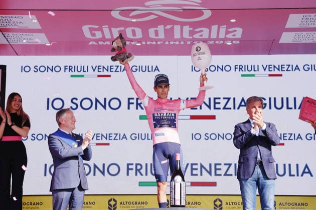 Portugal™s Afonso Oliveira Eulalio of Bahrain Victorious pink jersey on the podium during Stage 10, an individual time trial at the Giro d™Italia, from Viareggio to Massa, Italy, Tuesday, May 19, 2026.  Copyright: xGianxMattiaxD Albertox xLaPressex