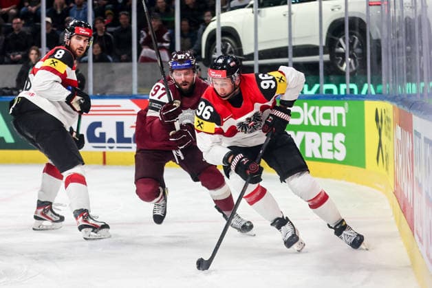 Ice hockey, Eishockey - IIHF WC 2026 ZURICH,SWITZERLAND,19.MAY.26 - ICE HOCKEY - IIHF Ice Hockey World Championship, WM, Weltmeisterschaft 2026, group stage, Austria vs Latvia. Image shows Haralds Egle (LAT) and Mario Huber (AUT).  GEPAxpictures xMaticxKlansek