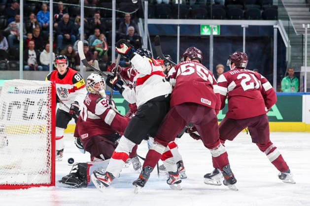 Ice hockey, Eishockey - IIHF WC 2026 ZURICH,SWITZERLAND,19.MAY.26 - ICE HOCKEY - IIHF Ice Hockey World Championship, WM, Weltmeisterschaft 2026, group stage, Austria vs Latvia. Image shows Kristers Gudlevskis (LAT), Peter Schneider (AUT), Roberts Mamcics and Rudolfs Balcers (LAT).  GEPAxpictures xMaticxKlansek