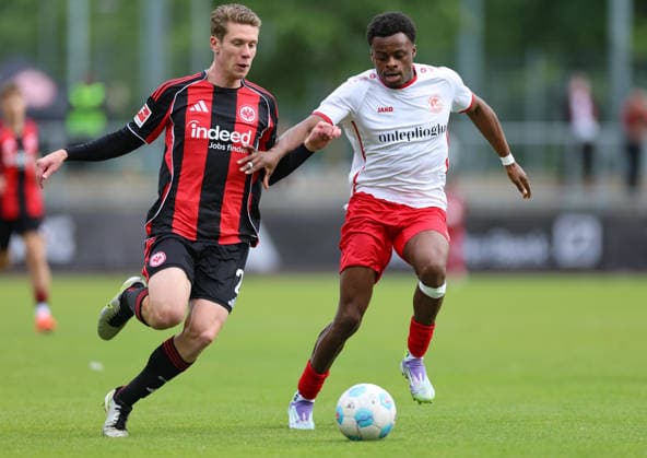 19 05 2026, Soccer test match, 125 years Rot Weiss Frankfurt, SG Rot Weiss Frankfurt Eintracht Frankfurt, v l , Elias Baum Eintracht Frankfurt , Leo Yan Djialeu Deula SG Rot Weiß Frankfurt DFL DFB REGULATIONS PROHIBIT ANY USE OF PHOTOGRAPHS AS IMAGE SEQUENCES AND OR QUASI VIDEO xdcx Copyright: HMBxMedia Claus