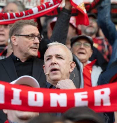 Soccer, Men, Season 2025 2026, 1 Bundesliga, 1 FC Union Berlin, Ordinary General Meeting at Stadion An der Alten Försterei, from left Managing Director Oskar Kosche 1 FC Union , President Dirk Zingler 1 FC Union during the anthem, 19 05 2026, Copyright: xMatthiasxKochx