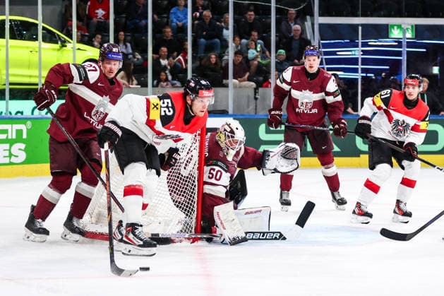 Ice hockey, Eishockey - IIHF WC 2026 ZURICH,SWITZERLAND,19.MAY.26 - ICE HOCKEY - IIHF Ice Hockey World Championship, WM, Weltmeisterschaft 2026, group stage, Austria vs Latvia. Image shows Oskars Cibulskis (LAT), Paul Huber (AUT) and Kristers Gudlevskis (LAT).  GEPAxpictures xMaticxKlansek
