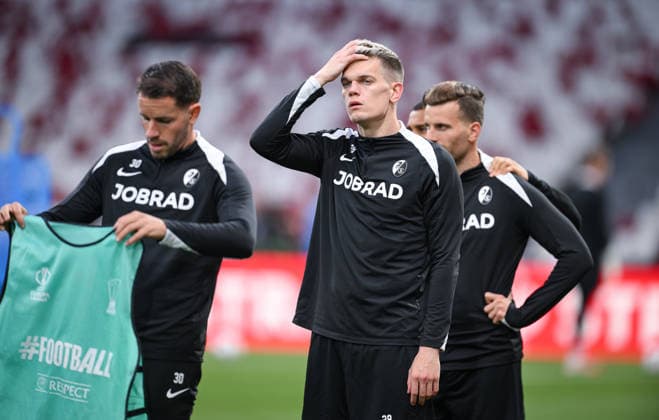 FOOTBALL EUROPA LEAGUE SEASON 2025 2026 Final in Istanbul 19 05 2026 SC Freiburg Aston Villa Training SC Freiburg at Besiktas Park Stadium, Matthias Ginter center pensive with Christian Guenter left , Lucas Hoeler right back