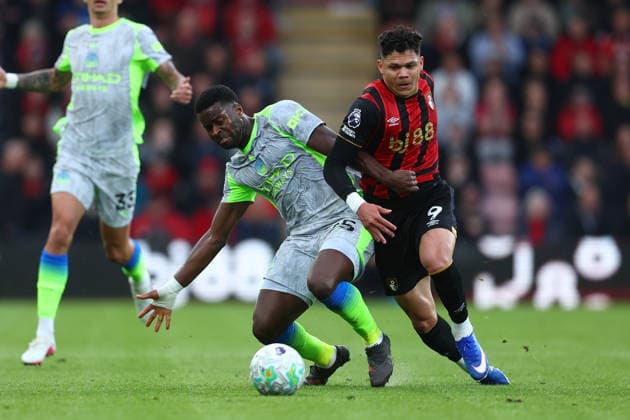 Bournemouth, England, 19th May 2026. Marc Guehi of Manchester City and Evanilson of Bournemouth challenge for the ball during the AFC Bournemouth vs Manchester City Premier League match at the Vitality Stadium, Bournemouth. Picture credit should read: Paul Terry Sportimage EDITORIAL USE ONLY. No use with unauthorised audio, video, data, fixture lists, club league logos or live services. Online in-match use limited to 120 images, no video emulation. No use in betting, games or single club league player publications. SPI_015_PT_Bournemouth_Man_City SPI-4809-0015