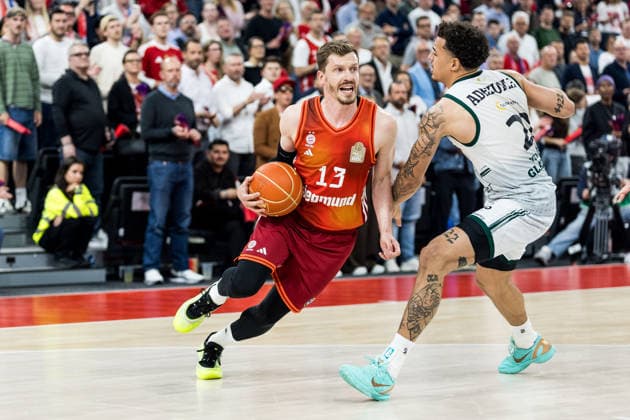 MUNICH, GERMANY - MAY 19: Andreas Andi Obst (FC Bayern Muenchen, 13) controls the ball against Nolan Adekunle (Vet-Concept Gladiators Trier, 22) during the easyCredit Basketball Bundesliga Playoffs Quarterfinal Game 2 between FC Bayern Muenchen vs. Vet-Concept Gladiators Trier at SAP Garden on match 2 of the Playoffs Quarterfinals Best of Five of easyCredit Basketball Bundesliga on May 19, 2026 in Munich, Germany. Bavaria Germany Copyright: xSteffiexWunderlx