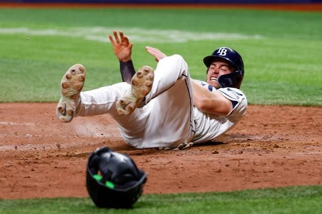 May 19, 2026, St. Petersburg, Florida, USA: Tampa Bay Rays pinch runner Carson Williams (7) slides into home plate and scores, while the Baltimore Orioles field the ball during the eighth inning at Tropicana Field on Tuesday, May 19, 2026, in St. Petersburg. St. Petersburg USA - ZUMAs70_ 20260519_zan_s70_056 Copyright: xJeffereexWoox