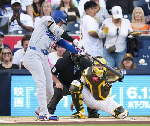 Baseball: Dodgers vs. Padres Los Angeles Dodgers designated hitter Shohei Ohtani hits a double in the first inning of a baseball game against the San Diego Padres at Petco Park in San Diego, California, on May 19, 2026.  A14AA0005587331P