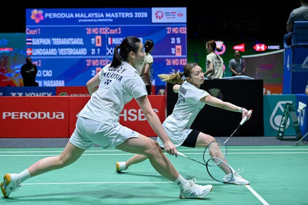 (260520) -- KUALA LUMPUR, May 20, 2026 -- Low Zi Yu (L) Noraqilah Maisarah compete during the women s doubles round of 32 match between Bao Lijing Cao Zihan of China and Low Zi Yu Noraqilah Maisarah of Malaysia at 2026 Malaysia Masters badminton tournament in Kuala Lumpur, Malaysia, May 20, 2026. (Photo by Xinhua) (SP)MALAYSIA-KUALA LUMPUR-BADMINTON-MALAYSIA MASTERS-WOMEN S DOUBLES ChongxVoonxChung 