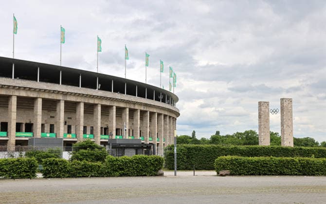 Berlin Olympic Stadium being prepared for DFB Cup final, flag branding for 2025 2026 20 05 2026 FC Bayern Munich vs VfB Stuttgart
