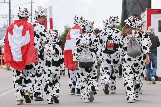 20 05 2026 Swiss Life Arena Zurich , SWITZERLAND, Men IIHF World Championship Zurich 2026 Group A Switzerland Austria A group of fans with cow costumes on the way to the stadium