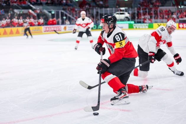 Ice hockey, Eishockey - IIHF WC 2026 ZURICH,SWITZERLAND,20.MAY.26 - ICE HOCKEY - IIHF Ice Hockey World Championship, WM, Weltmeisterschaft 2026, group stage, Austria vs Switzerland. Image shows Leon Kolarik (AUT) and Sven Jung (SUI).  GEPAxpictures xMaticxKlansek