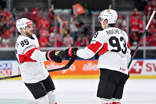 ZURICH, SWITZERLAND MAY 20 Theo Rochette of Switzerland R celebrates his goal with Sven Andrighetto of Switzerland L during the 2026 IIHF Ice Hockey World Championship Switzerland game between Austria and Switzerland at Swiss Life Arena on May 20, 2026 in Zurich, Zurich Zurich Swiss Life Arena Zurich Switzerland Copyright: xJustPictures.ch AndreaxBrancax jp-en-EuSpIm-JP7_ANB_Aut_Swi_20052026_7342
