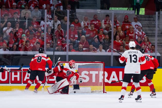 ZURICH, SWITZERLAND - MAY 20: Florian Vorauer (Austria, 33) receiving goal during the Preliminary Round - Group A Match 25 between Austria and Switzerland at the IIHF Ice hockey, Eishockey World Championship, WM, Weltmeisterschaft 2026, Swiss Life Arena on May 20, 2026 in Zurich, Switzerland. Zurich Switzerland Copyright: xTimoxSteinx