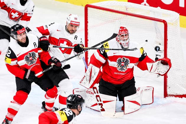 Ice hockey, Eishockey - IIHF WC 2026 ZURICH,SWITZERLAND,20.MAY.26 - ICE HOCKEY - IIHF Ice Hockey World Championship, WM, Weltmeisterschaft 2026, group stage, Austria vs Switzerland. Image shows Bernd Wolf (AUT), Nino Niederreiter (SUI) and Florian Vorauer (AUT).  GEPAxpictures xMaticxKlansek