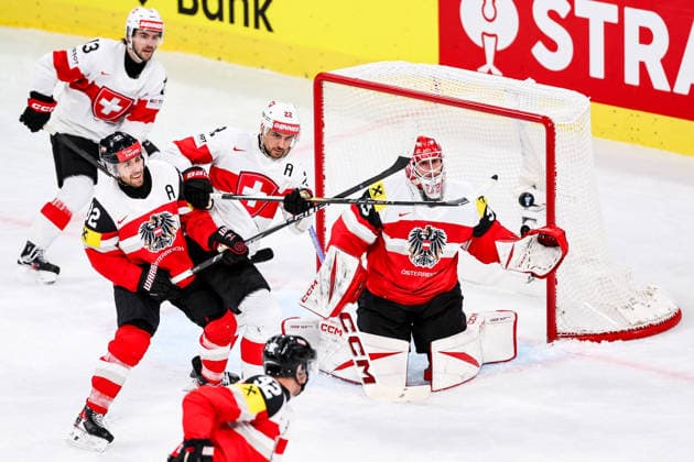 Ice hockey, Eishockey - IIHF WC 2026 ZURICH,SWITZERLAND,20.MAY.26 - ICE HOCKEY - IIHF Ice Hockey World Championship, WM, Weltmeisterschaft 2026, group stage, Austria vs Switzerland. Image shows Bernd Wolf (AUT), Nino Niederreiter (SUI) and Florian Vorauer (AUT).  GEPAxpictures xMaticxKlansek