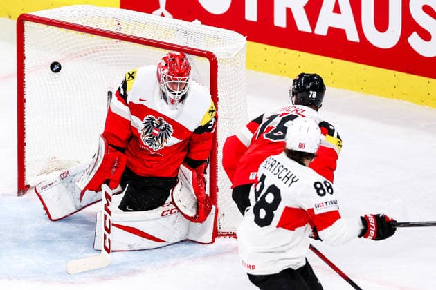 Ice hockey, Eishockey - IIHF WC 2026 ZURICH,SWITZERLAND,20.MAY.26 - ICE HOCKEY - IIHF Ice Hockey World Championship, WM, Weltmeisterschaft 2026, group stage, Austria vs Switzerland. Image shows Florian Vorauer (AUT) and Christoph Bertschy (SUI).  GEPAxpictures xMaticxKlansek