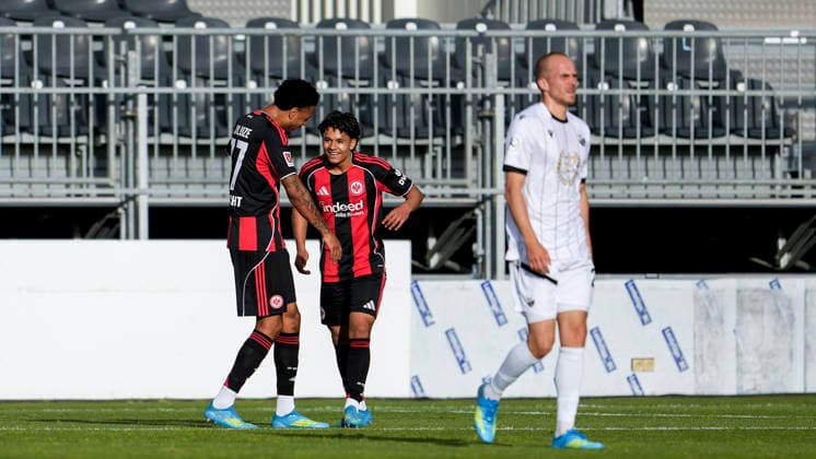 from left goal scorer Jeremiaha Maluze SGE, 37 , Marvin Dills SGE, 45 , players of Eintracht Frankfurt, cheer about the goal to 1 1, jubilation, goal celebration, celebrate the goal, goal, celebration, cheers about the goal, rejoice, joy, rejoices, optimistic, positive, game scene, highlight, action, 20 05 2026, Sandhausen Germany , football, anniversary game, SV Sandhausen Eintracht Frankfurt xozx