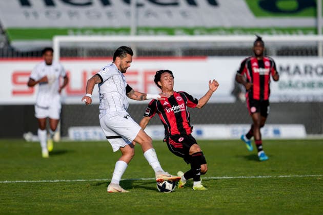 v li Pascal Testroet SVS, 37 , Keita Kosugi SGE, 26 , duel, duel, tackle, tackling, dynamics, action, action, 20 05 2026, Sandhausen Germany , football, anniversary match, SV Sandhausen Eintracht Frankfurt xozx
