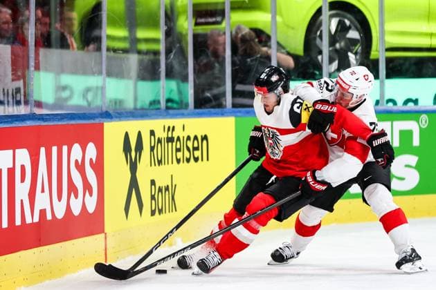 Ice hockey, Eishockey - IIHF WC 2026 ZURICH,SWITZERLAND,20.MAY.26 - ICE HOCKEY - IIHF Ice Hockey World Championship, WM, Weltmeisterschaft 2026, group stage, Austria vs Switzerland. Image shows Simeon Schwinger (AUT) and Dominik Egli (SUI).  GEPAxpictures xMaticxKlansek