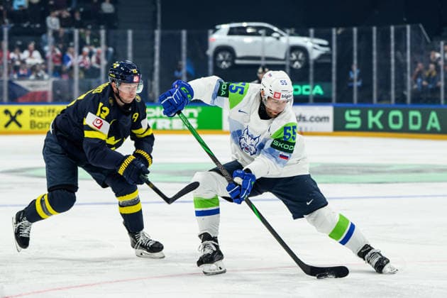 260520 Lucas Raymond of Sweden and Robert Sabolic of Slovenia during the 2026 IIHF Ice Hockey World Championship between Sweden and Slovenia on May 20, 2026 in Fribourg Photo Jesper Zerman BILDBYRAN kod JZ JZ0722 ishockey ice hockey ishockey vm 2026 vm 2026 iihf world championship sverige sweden slovenia bbeng bbauto  Copyright: JESPERxZERMAN BB260520JZ071