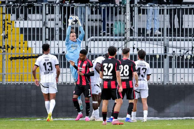 Noah Loos goalkeeper, SVS, 40 intercepts a cross, action, action scene, in the penalty area, penalty area scene, 20 05 2026, Sandhausen Germany , football, anniversary match, SV Sandhausen Eintracht Frankfurt xozx