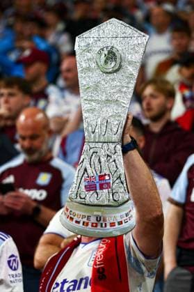 An Aston Villa fan holds up a trophy cut out, Freisteller SC Freiburg v Aston Villa, UEFA Europa League, Final, Football, Besiktas Park, Istanbul, Turkiye - 20 May 2026Istanbul Besiktas Park United Kingdom EDITORIAL USE ONLY No use with unauthorised audio, video, data, fixture lists, club league logos or live services. Online in-match use limited to 120 images, no video emulation. No use in betting, games or single club league player publications. Copyright: xJamesxMarsh Shutterstockx 16883157aq