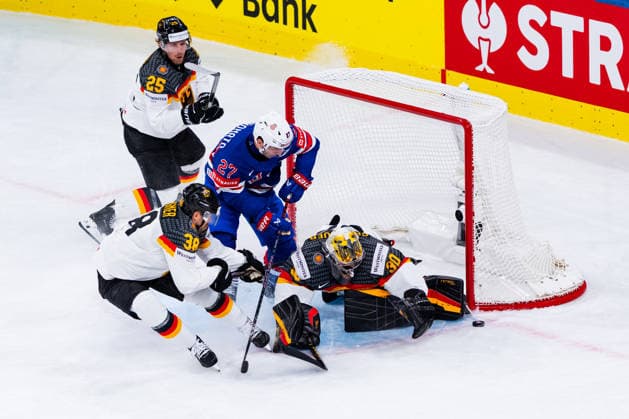 ZURICH, SWITZERLAND - MAY 20: Matt Coronato (United States, 27) against Leon Huettl (Germany, 25), Fabio Wagner (Germany, 38) and Philipp Grubauer (Germany, 30) during the Preliminary Round - Group A Match 27 between United States and Germany at the IIHF Ice hockey, Eishockey World Championship, WM, Weltmeisterschaft 2026, Swiss Life Arena on May 20, 2026 in Zurich, Switzerland. Zurich Switzerland Copyright: xTimoxSteinx