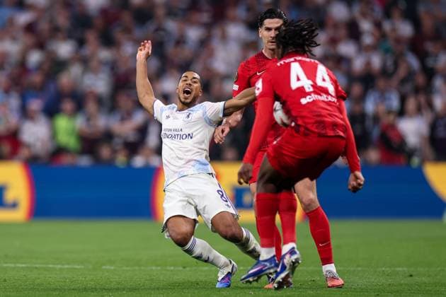 Youri Tielemans of Aston Villa goes down after a challenge from Igor Matanovic of SC Freiburg SC Freiburg v Aston Villa, UEFA Europa League, Final, Football, Besiktas Park, Istanbul, Turkiye - 20 May 2026Istanbul Besiktas Park United Kingdom EDITORIAL USE ONLY No use with unauthorised audio, video, data, fixture lists, club league logos or live services. Online in-match use limited to 120 images, no video emulation. No use in betting, games or single club league player publications. Copyright: xRaddadxJebarah Shutterstockx 16883158ac