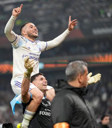 ISTANBUL, TURKEY - MAY 20: Aston Villa goalkeeper Emiliano Martinez and Emiliano Buendia of Aston Villa celebrate after winning the UEFA Europa League Final 2026 match between SC Freiburg and Aston Villa FC at Besiktas Park on May 20, 2026 in Istanbul, Turkey.  Copyright: xMBxMediax