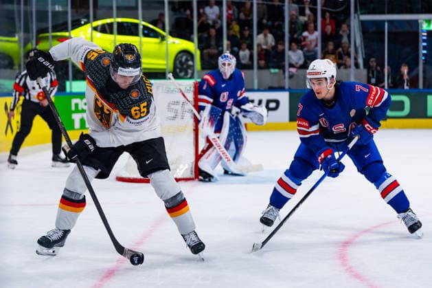 ZURICH, SWITZERLAND - MAY 20: Marc Michaelis (Germany, 65) in the battle for the puck with Ryan Ufko (United States,7) during the Preliminary Round - Group A Match 27 between United States and Germany at the IIHF Ice hockey, Eishockey World Championship, WM, Weltmeisterschaft 2026, Swiss Life Arena on May 20, 2026 in Zurich, Switzerland. Zurich Switzerland Copyright: xTimoxSteinx
