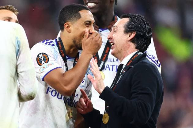 Youri Tielemans of Aston Villa (L) and Aston Villa manager Unai Emery (R) in front of the winners board SC Freiburg v Aston Villa, UEFA Europa League, Final, Football, Besiktas Park, Istanbul, Turkiye - 20 May 2026Istanbul Besiktas Park United Kingdom EDITORIAL USE ONLY No use with unauthorised audio, video, data, fixture lists, club league logos or live services. Online in-match use limited to 120 images, no video emulation. No use in betting, games or single club league player publications. Copyright: xJamesxMarsh Shutterstockx 16883157hi