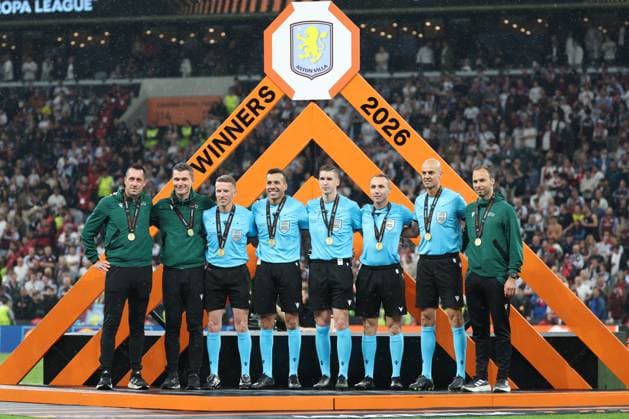 20.05.2026 - SOCCER - 2025-2026 UEFA EUROPA LEAGUE FINAL, SC Freiburg vs Aston Villa match officials receiving their medals from the UEFA President during the pre-match ceremony in Istanbul, standing on the presentation stage with referees being honored before kickoff. ISTANBUL ISTANBUL, BESIKTAS PARK TÜPRAS STADIUM BESIKTAS PARK TÜPRAS STADIUM TÜRKIYE