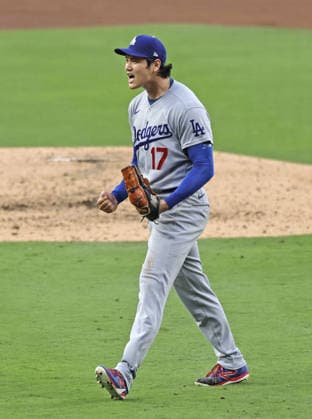 Baseball: Dodgers vs. Padres Los Angeles Dodgers two-way player Shohei Ohtani shouts after escaping a bases-loaded jam in the fifth inning of a baseball game against the San Diego Padres at Petco Park in San Diego, California, on May 20, 2026.  A14AA0005592565P