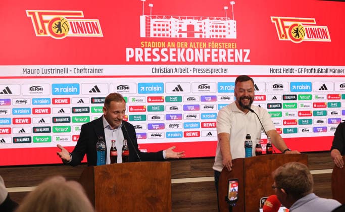 Coach Mauro Lustrinelli, press spokesman Christian Arbeit PK Press conference to introduce the new head coach Sport Football Soccer Bundesliga Men DFL Season 2025 2026 21 05 2026 1 FC Union Berlin FCU DFL regulations prohibit any use of photographs as image sequences and or quasi video