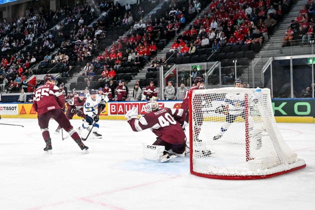 ZURICH, SWITZERLAND MAY 21 Henri Jokiharju of Finland L scores a goal against goalkeeper Mareks Mitens of Latvia during the 2026 IIHF Ice Hockey World Championship Switzerland game between Latvia and Finland at Swiss Life Arena on May 21, 2026 in Zurich, Zurich Zurich Swiss Life Arena Zurich Switzerland Copyright: xJustPictures.ch AndreaxBrancax jp-en-EuSpIm-JP7_ANB_Lat_Fin_21052026_8892