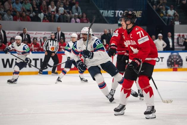 FRIBOURG, FRIBOURG - MAY 21: Andreas Martinsen of Norway battles with Macklin Celebrini of Canada during the 2026 IIHF World Championship, WM, Weltmeisterschaft Preliminary Round Group B match between Canada and Norway at BCF Arena on May 21, 2026 in Fribourg, Fribourg, Switzerland. Copyright: xLivioxBaeriswylx xSPPx Sportspressphoto_SPR151119