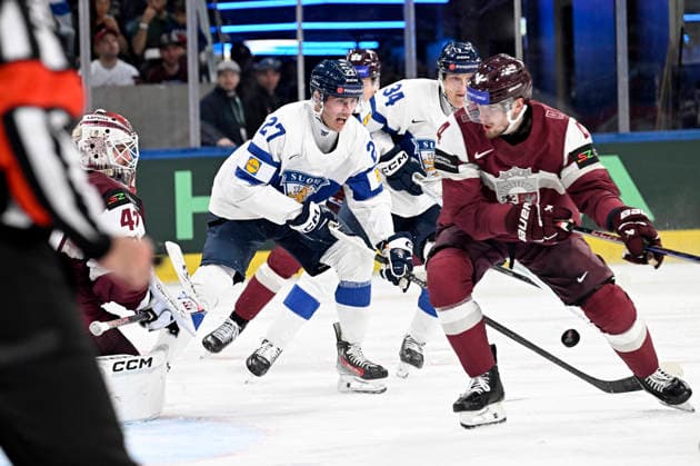 Goalkeeper Mareks Mitens (left) and Kristofers Bindulis (right) of Latvia and Janne Kuokkanen (2nd left) and Aatu Räty of Finland in action during the 2026 IIHF Ice hockey, Eishockey World Championships preliminary round group A match between Latvia and Finland in Zurich on May 21, 2026. - RONI REKOMAA Zürich Switzerland g7DWvTcClLc  Copyright: xRonixRekomaax g7DWvTcClLc