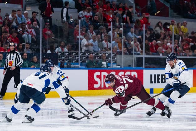 ZURICH, SWITZERLAND - MAY 21: Ville Hainola (Finland, 41), Lenni Haemeenaho (Finland, 92) and Aleksander Barkov (Finland, 16) against Deniss Smirnovs (Latvia, 73) during the Preliminary Round - Group A Match 29 between Latvia and Finland at the IIHF Ice hockey, Eishockey World Championship, WM, Weltmeisterschaft 2026, Swiss Life Arena on May 21, 2026 in Zurich, Switzerland. Zurich Switzerland Copyright: xTimoxSteinx