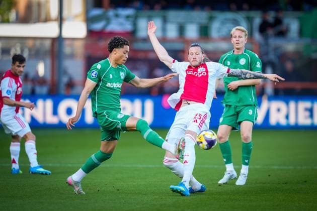 VOLENDAM , 21-05-2026 , Kras Stadium, season 2025 2026 , Play-offs for European football , Dutch Eredivisie Football . Match between Ajax and FC Groningen , picture shows Ajax player Wout Weghorst and FC Groningen player Travis Hernes Ajax - Groningen (play off)  x203864991x Copyright: