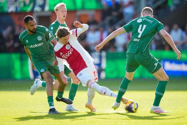 VOLENDAM , 21-05-2026 , Kras Stadium, season 2025 2026 , Play-offs for European football , Dutch Eredivisie Football . Match between Ajax and FC Groningen , picture shows FC Groningen player Marvin Peersman , Ajax player Mika Godts and FC Groningen player Dies Janse Ajax - Groningen (play off)  x203865035x Copyright: