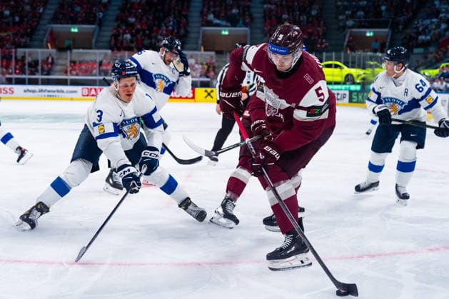 ZURICH, SWITZERLAND - MAY 21: Olli Maeaettae (Finland, 3) in the battle for the puck with Artus Andzans (Latvia, 5) during the Preliminary Round - Group A Match 29 between Latvia and Finland at the IIHF Ice hockey, Eishockey World Championship, WM, Weltmeisterschaft 2026, Swiss Life Arena on May 21, 2026 in Zurich, Switzerland. Zurich Switzerland Copyright: xTimoxSteinx