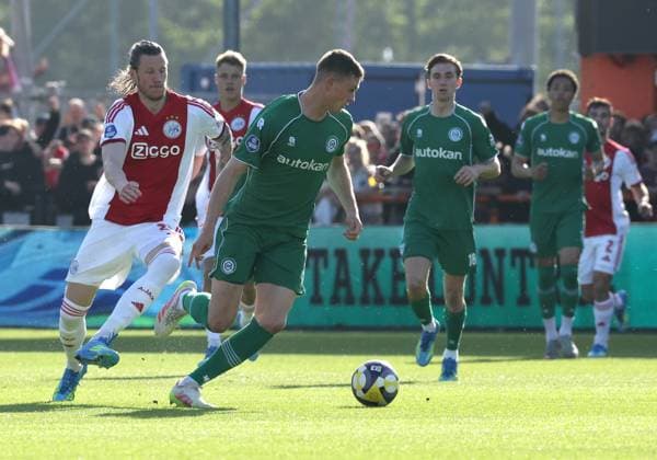 VOLENDAM lr Ajax player Wout Weghorst with FC Groningen player Dies Janse during the Dutch Eredivisie match between Ajax and FC Groningen at Kras Stadium on 21 May 2026 in Volendam, the Netherlands Photo by DeFodi Images