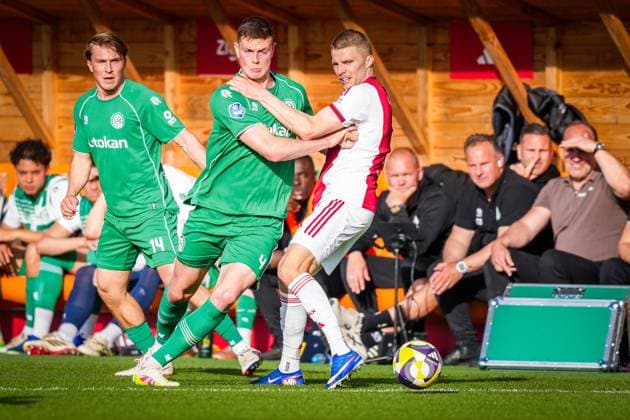 VOLENDAM , 21-05-2026 , Kras Stadium, season 2025 2026 , Play-offs for European football , Dutch Eredivisie Football . Match between Ajax and FC Groningen , picture shows FC Groningen player Dies Janse and Ajax player Anton Gaaei Ajax - Groningen (play off)  x203865388x Copyright: