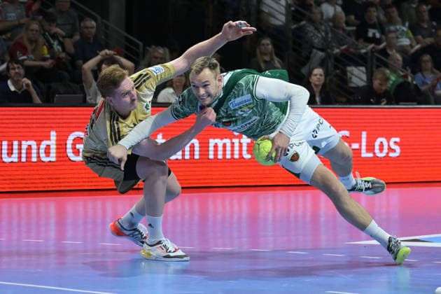 21 05 2026, xlakx, Handball Daikin HBL, Fuechse Berlin TSV Hannover Burgdorf v l Lukas Stutzke TSV Hannover Burgdorf , Mathias Gidsel Fuechse Berlin duel, duel, fight, tackle Berlin Daniel Lakomski